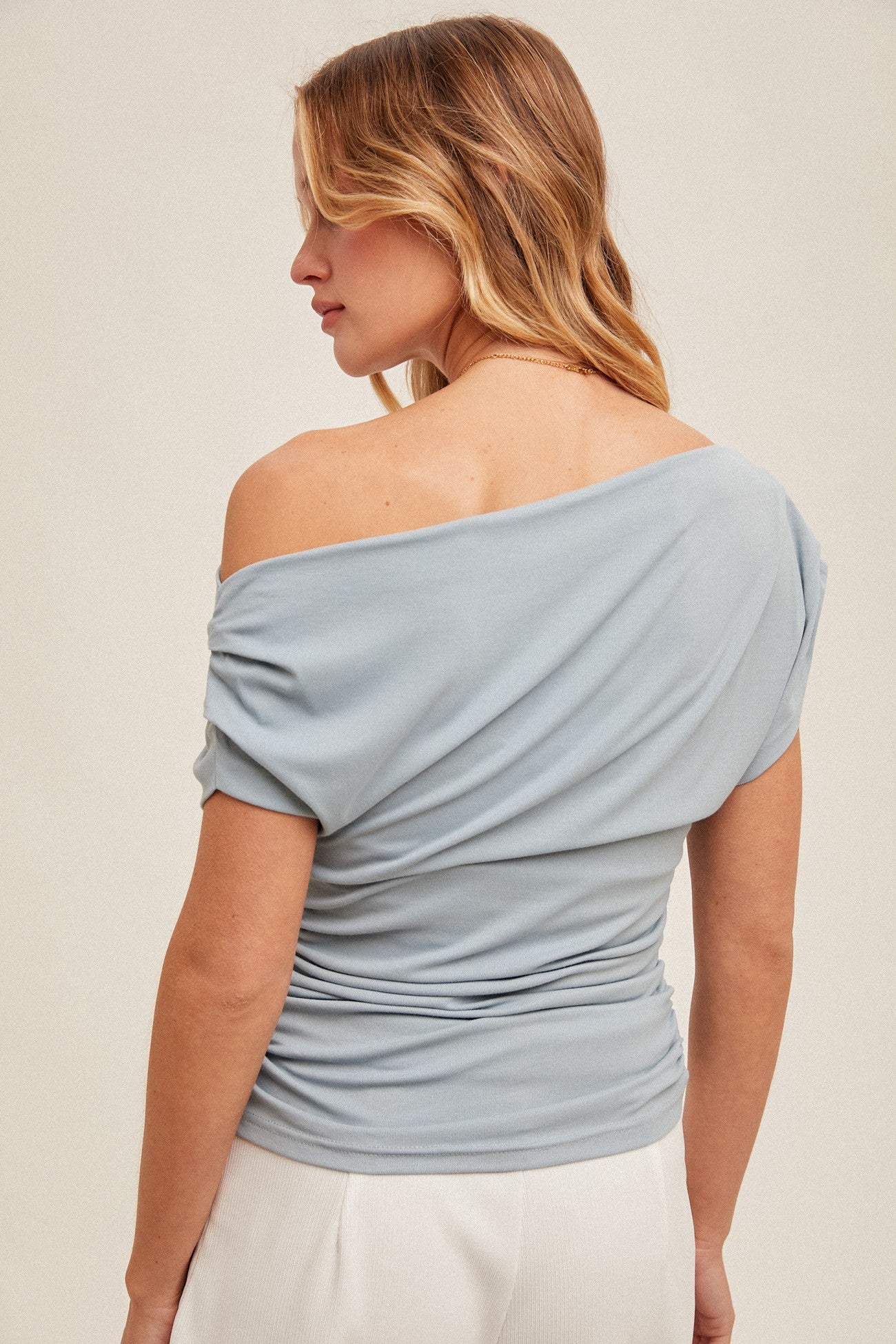 Asymmetrical Neck Line Ruched Knit Top (Assorted Colors)