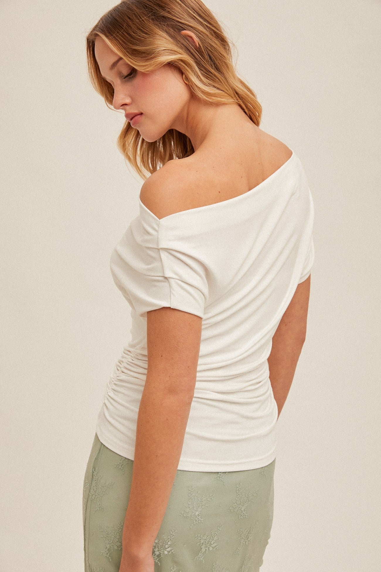 Asymmetrical Neck Line Ruched Knit Top (Assorted Colors)